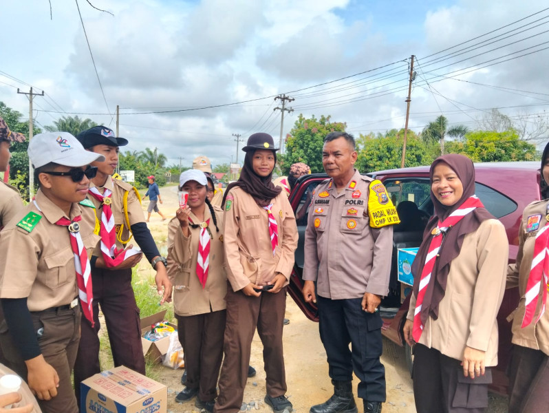 Kapolsek Rengat Barat  Ajak Anggota Pramuka Gunakan Hak Pilih dan Jaga Kondusif