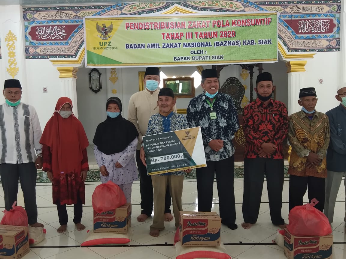Baznas-Siak Salurkan Bantuan Warga Terdampak Covid-19  di Koto Gasib 