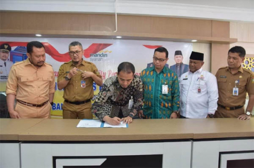 Pemkab Kampar Jalin MoU Dana Talangan BPJS dengan Bank Syariah Mandiri