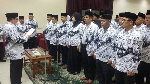 Dr. Neneng Suryani, M.Pd Terpilih Sebagai Ketua PGRI Kabupaten Kampar Masa Bakti 2018-2023