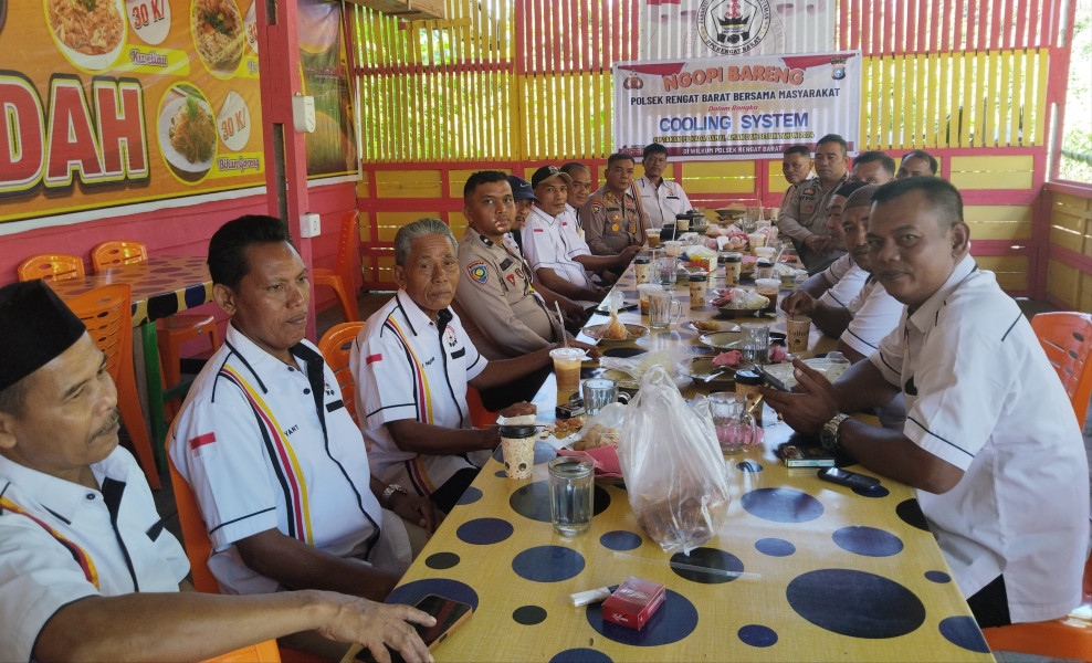 Ngopi Bareng dengan Pengurus PKDP, Kapolsek Rengat Barat Ajak Warga Ciptakan Pilkada Damai