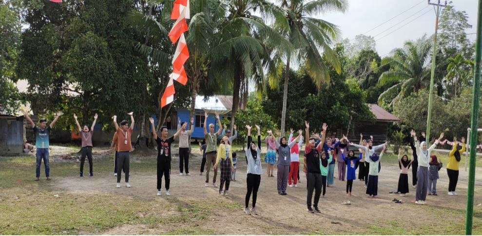 Mahasiswa KKN UMRI Pasang Papan Petunjuk Arah dan Gelar Senam Bersama Warga Desa Lubuk Gaung Bengkalis