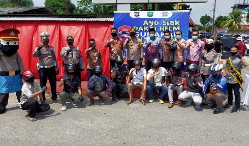 Bupati dan Kapolres Siak Gelar Pemantapan Kawasan Wajib Helm dan Masker di Perawang