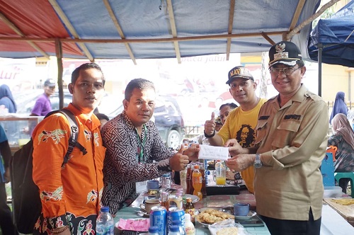 Bupati Inhil Turunkan Perahu Tuduang Kuantan Sahabat Wardan di Pacu Jalur